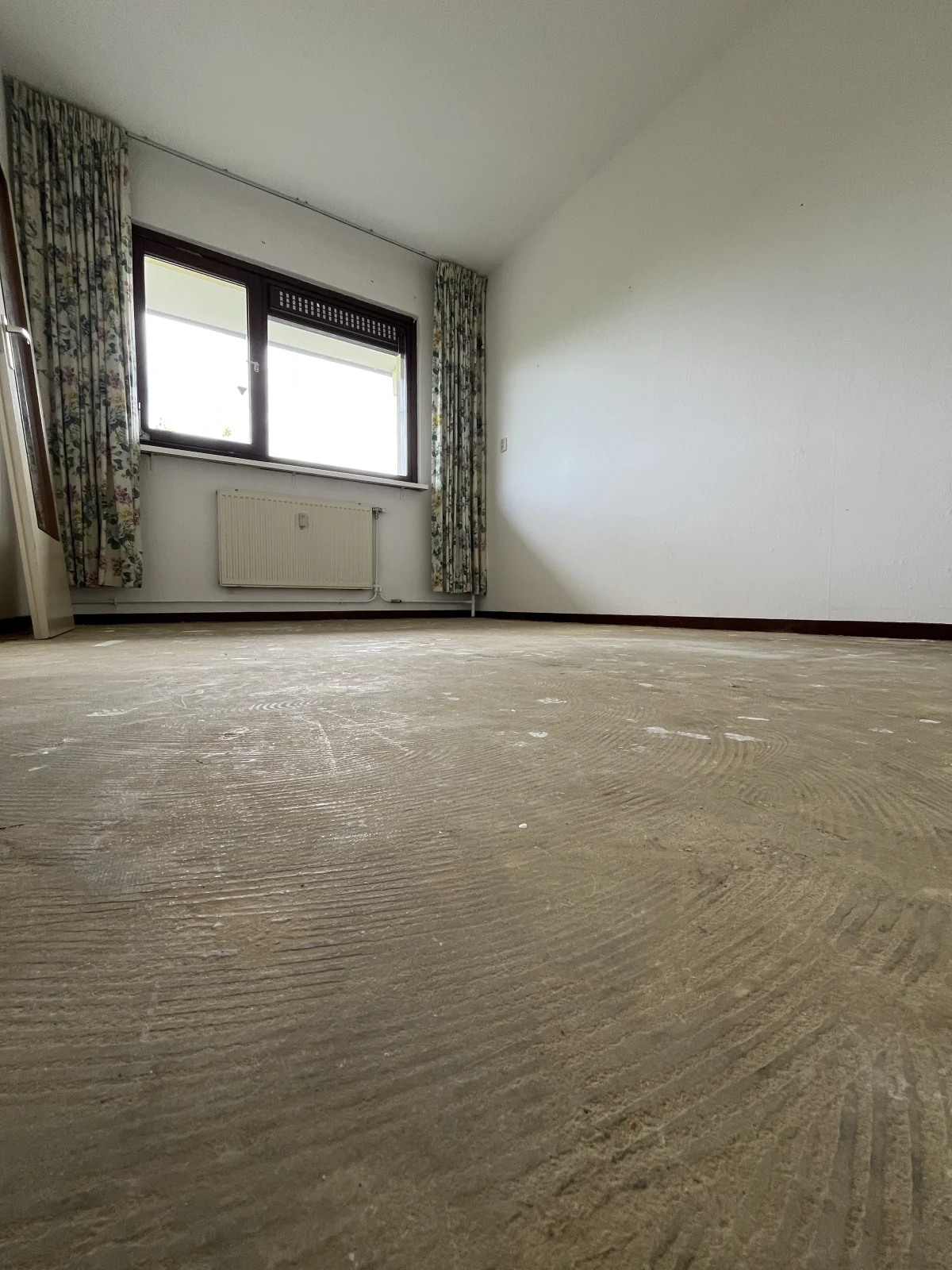 Woning leeg en bezemschoon opgeleverd